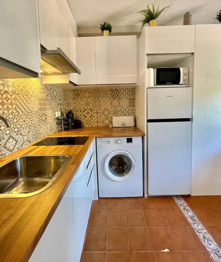 Bonito apartamento con terraza, jardín y piscina Cala'N Bosch  Exterior foto