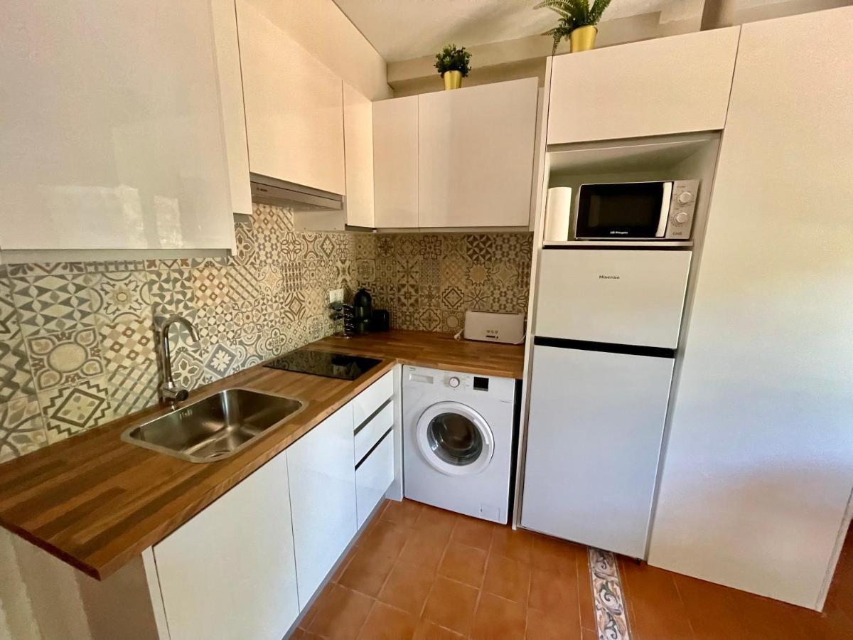 Bonito apartamento con terraza, jardín y piscina Cala'N Bosch  Exterior foto